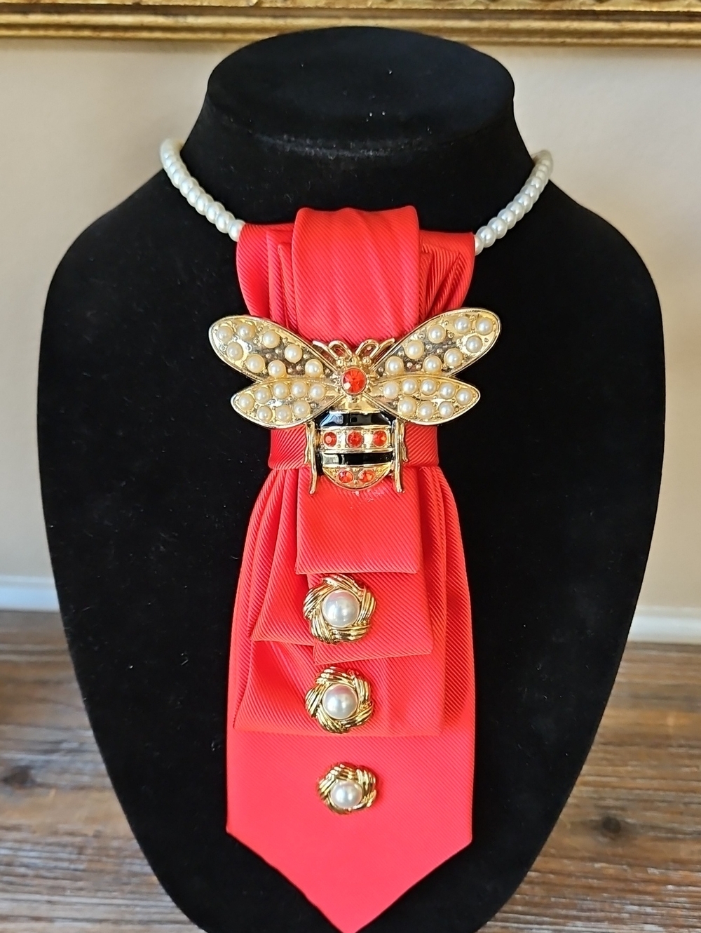 Upcycled Orange Red Necktie Necklace with Gold Bee Brooch and Pearl Accents - Picture 1 of 6